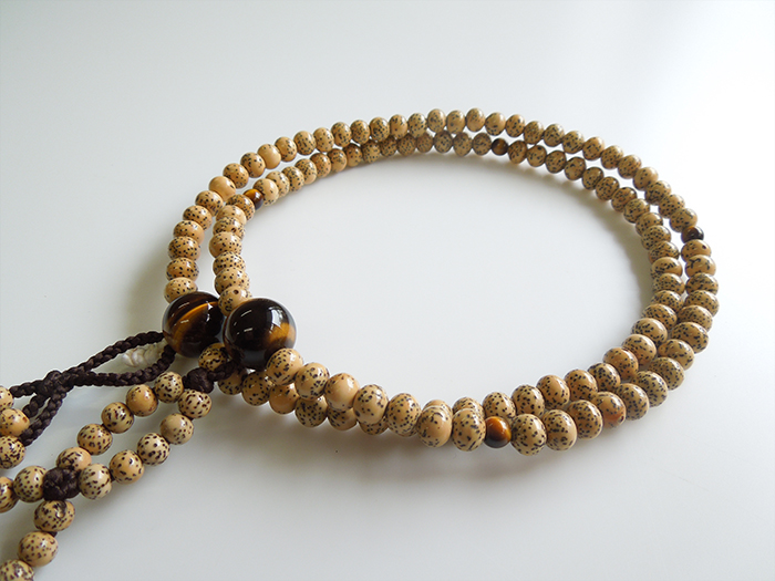 星月菩提樹二双半法華 虎目石仕立 焦茶かがり梵天 お数珠の安田念珠店